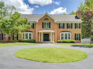 Grand Brick Estate Surrounded by Woods