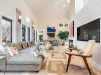 FURNISHED POST-MODERN HOME FOR RENT ON A LANDSCAPED ACRE