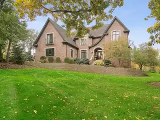 Timeless Sophistication and Contemporary Convenience in Stunning Brick Home