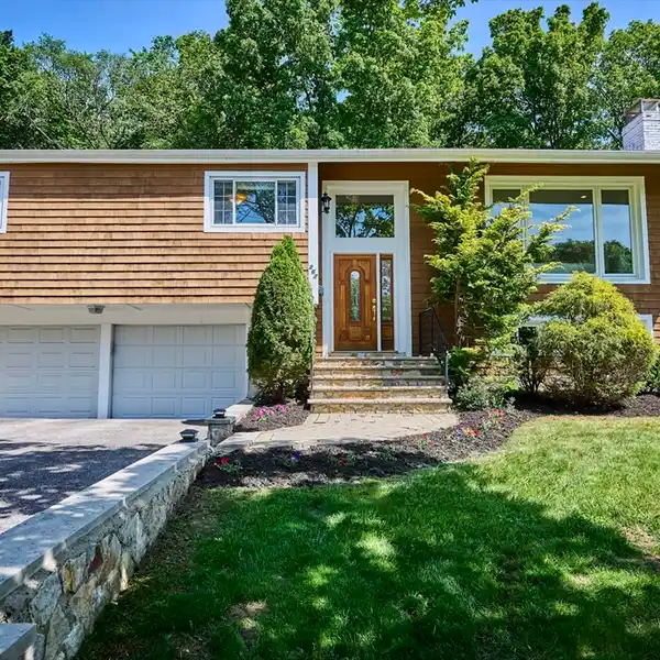OPEN AND ELEGANT RAISED RANCH
