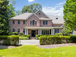 Stunning Custom Home in the Sought-after Spring Brook Section