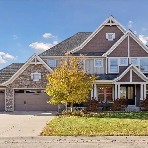 TIMELESS CRAFTSMANSHIP MEETS SERENE PONDFRONT LIVING