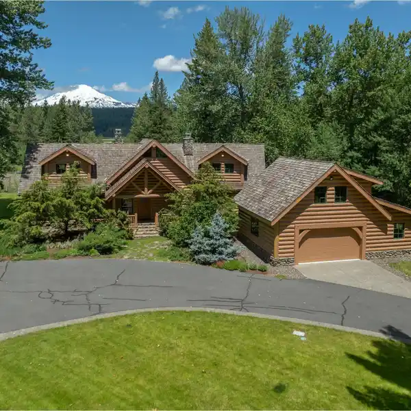 CUSTOM LOG HOME ON 20 ACRES