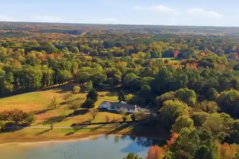 Southern Charm Meets Luxury on Stocked Pond
