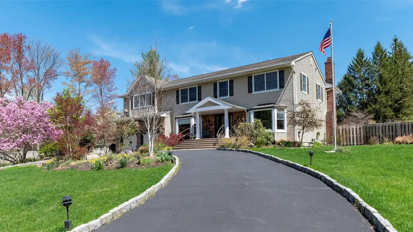 Luxurious and Comfortable Colonial Home on a Serene Acre