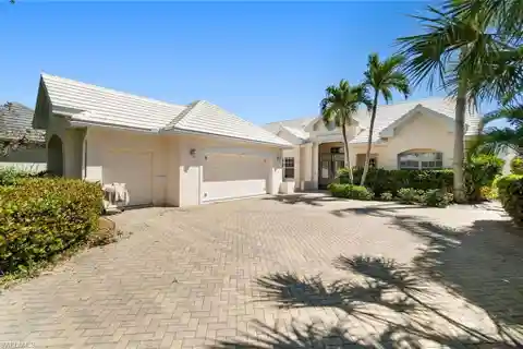 Immaculately Maintained Home with Sweeping Golf and Lake Views
