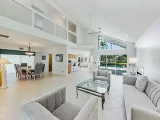 Serene Waterfront Retreat with Golf Membership Included