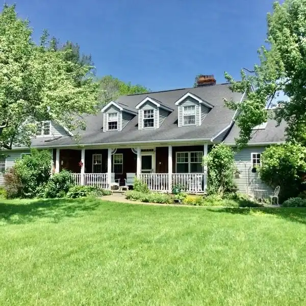 GORGEOUS HOME AND BARN ON NINE ACRES