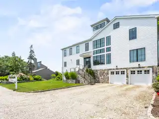 Ultimate Blend of Waterfront Living and Luxurious Coastal Design