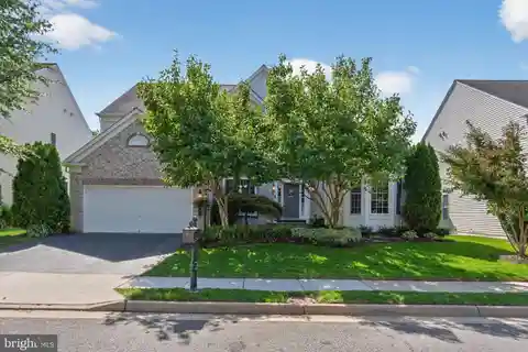 Refined Living with Dual Suites and Sunroom Charm