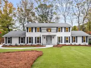 Stately Brick Residence with Impeccable Designer Updates