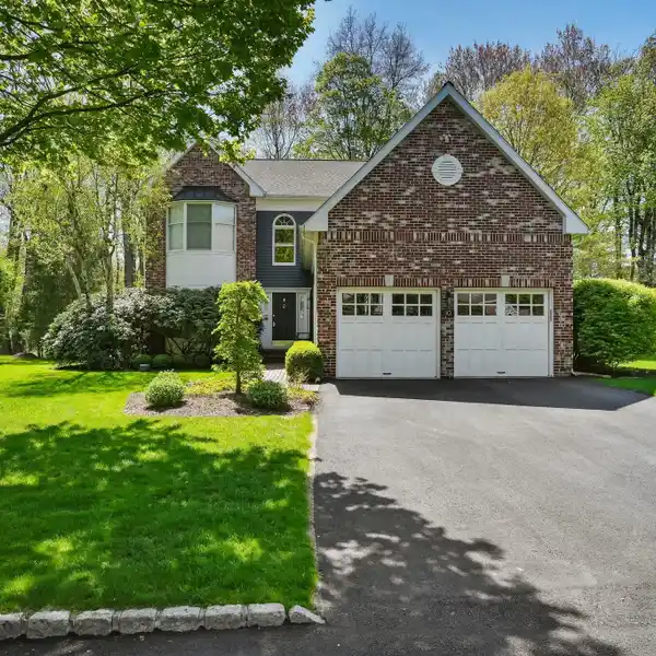 PRIVATE COLONIAL WITH A SPRAWLING YARD