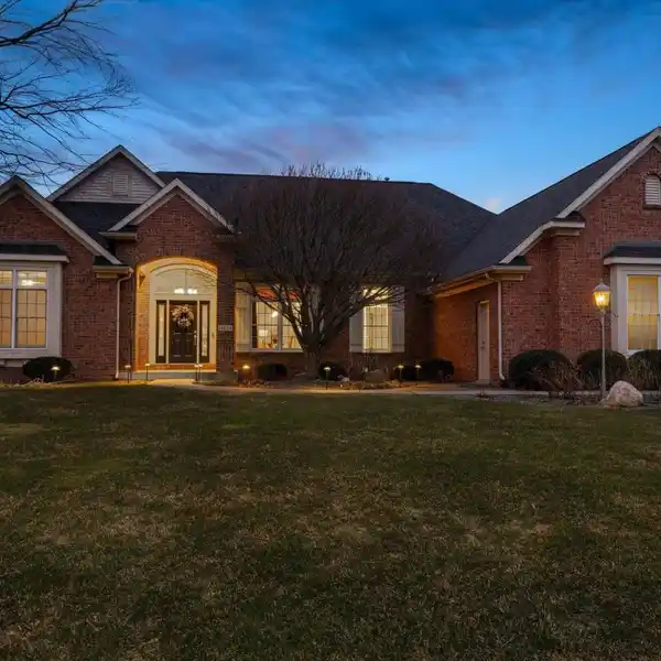 BEAUTIFULLY MAINTAINED WATERFRONT BRICK RANCH IN COVINGTON SHORES