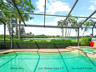 Stunning Pool Home with Water & Golf Course Views