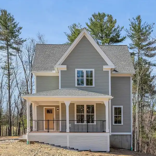 THOUGHTFUL NEW CONSTRUCTION WITHIN WOODWARD VILLAGE