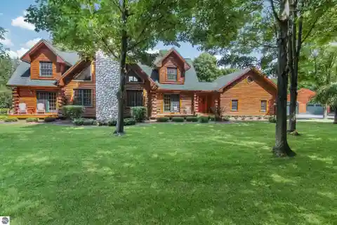 Beautifully Maintained Log-Sided Home on 8.23 Acres