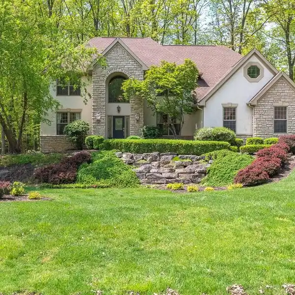 REFINED LIVING ON A WOODED ACRE
