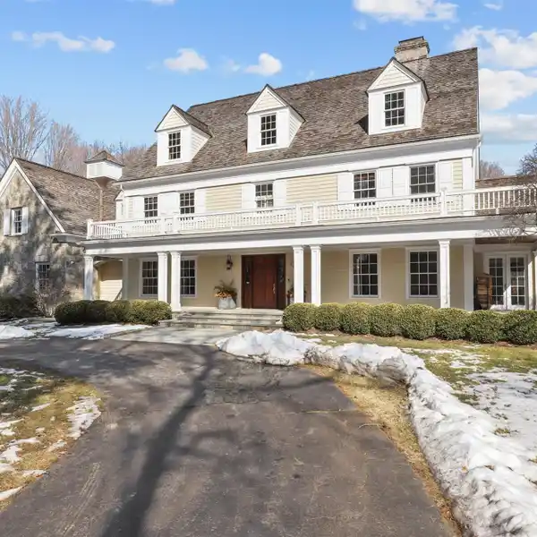 EXTENSIVELY UPDATED CENTER HALL COLONIAL IN THE HEART OF POUND RIDGE