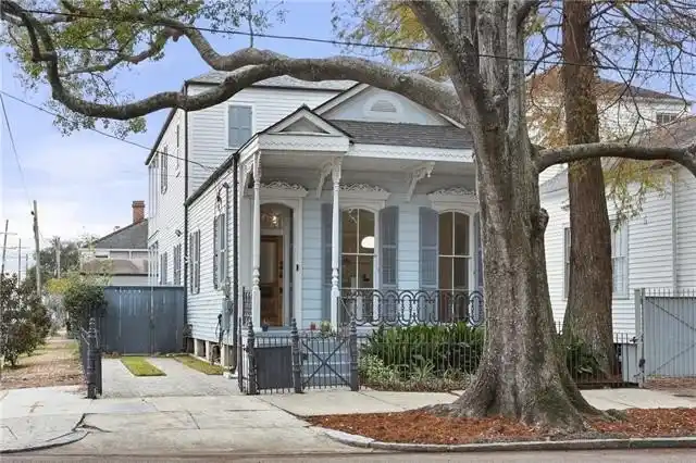 Eastlake Victorian Side Hall Cottage with Carriage House