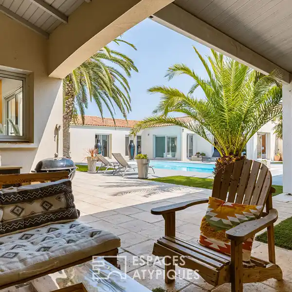 ELEGANT MEDITERRANEAN-STYLE HOME ON LANDSCAPED PLOT