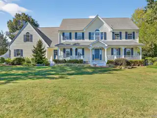 Classic Colonial with Rocking Chair Front Porch