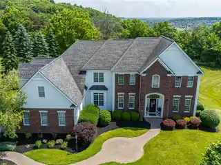 Elegant Brick Estate Steps from Cobblestone Country Club