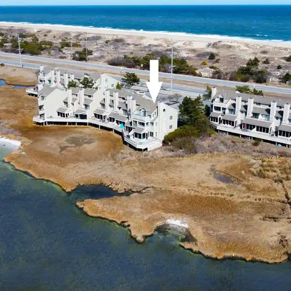 WATERFRONT LIVING WITH EXPANSIVE WRAPAROUND DECK