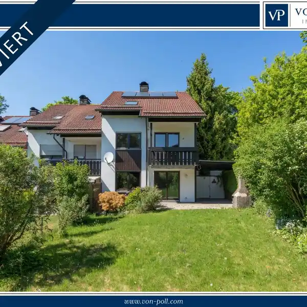 WELL-MAINTAINED CORNER HOME IN IDYLLIC SETTING