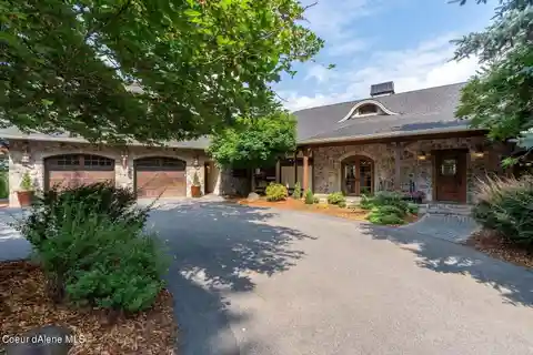 Two Homes, One Spectacular Estate: 9.39 Acres Overlooking Hayden Lake