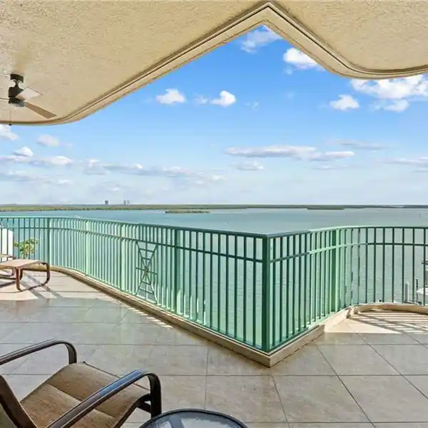 HIGHER-FLOOR END UNIT WITH UNRIVALED RIVER AND GULF VIEWS