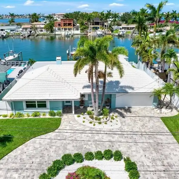 MAGNIFICENT WATERFRONT HOME IN COVETED OAKHURST SHORES