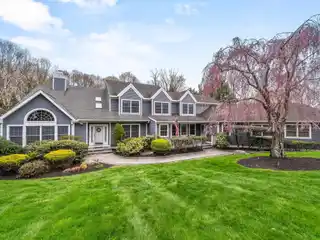 Impeccable Colonial Nestled on Almost 2 Private Acres