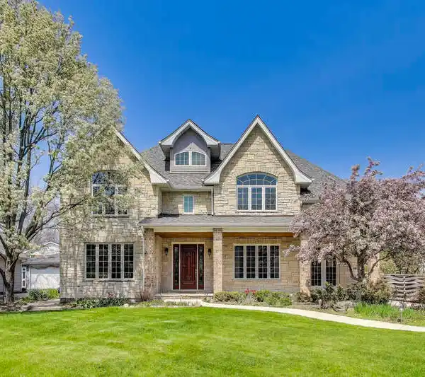 DISTINGUISHED BRICK AND STONE RESIDENCE