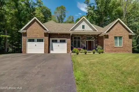 Custom Brick Beauty with Backyard Vacation Oasis