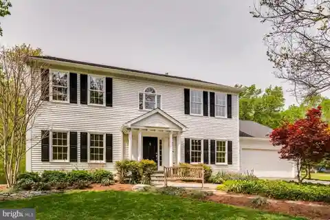 Elegant Colonial Retreat on Tranquil One-acre Lot