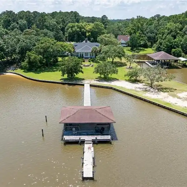 WATERFRONT ESTATE WITH PRIVATE BEACH AND PIER