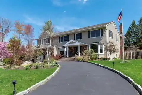 Luxurious and Comfortable Colonial Home on a Serene Acre