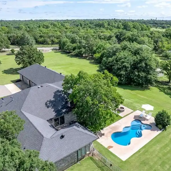 RENOVATED AND EXPANDED HOME ON FIVE SCENIC ACRES