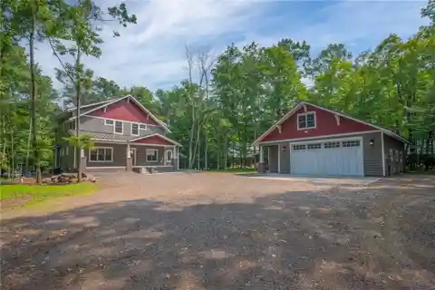 Stunning Craftsman Lake Home on Shell Lake – 150’ of Sandy Shoreline