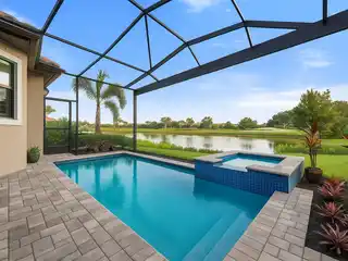 Impeccably Maintained Home in Prestigious Golf Community