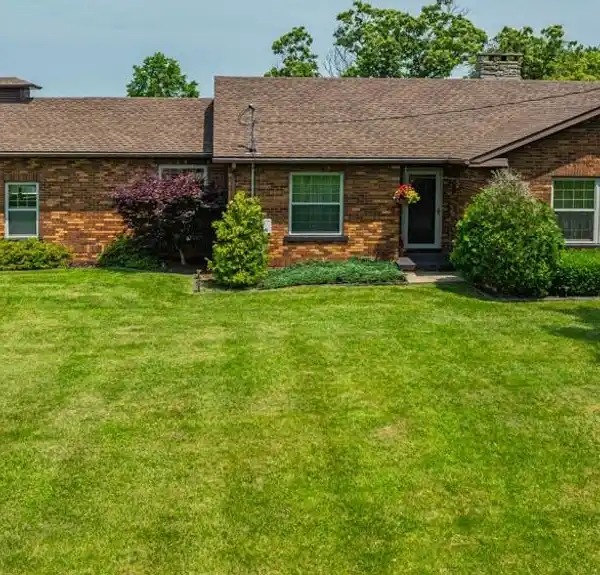 BEAUTIFUL BRICK RANCH ON 27-PLUS ACRES