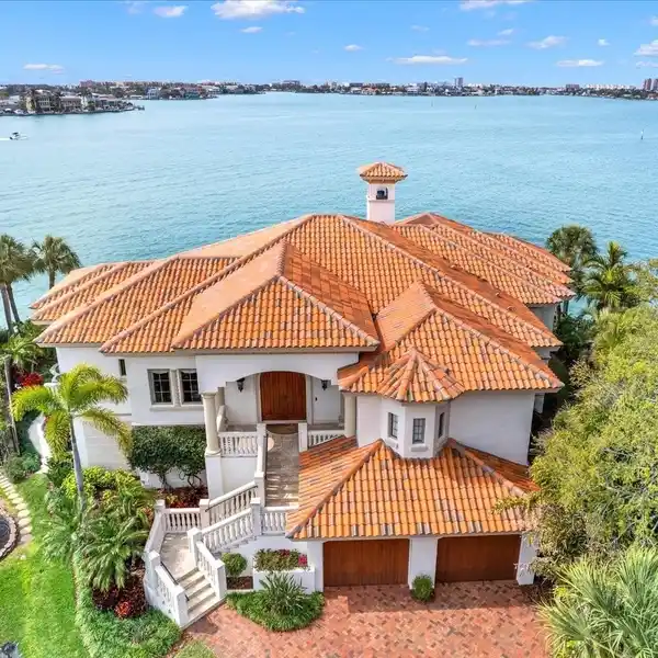 WATERFRONT MASTERPIECE IN PRESTIGIOUS OAKHURST SHORES