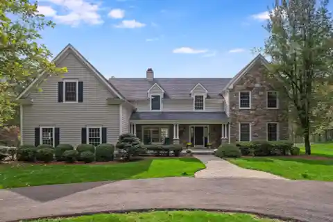 Striking Stone and Cedar Residence