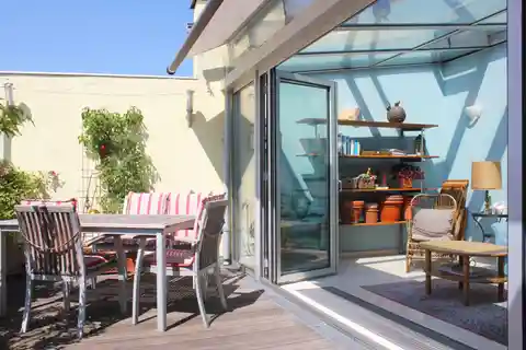 Sunlit Art Nouveau Penthouse with Private Roof Terrace