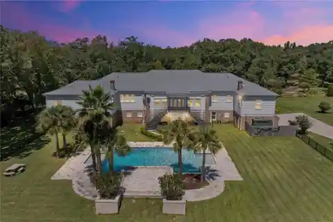 Secluded 58-Acre Estate with Lake and Pool