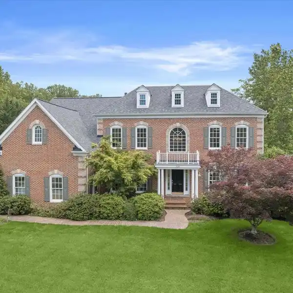 EXCEPTIONAL BRICK-FRONT COLONIAL HOME