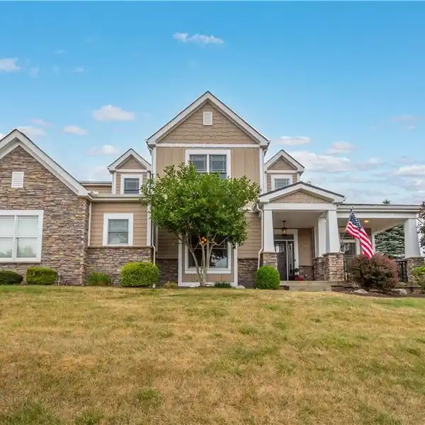 CUSTOM HOME IN SOUTH FAYETTE ON A DOUBLE TIERED LOT