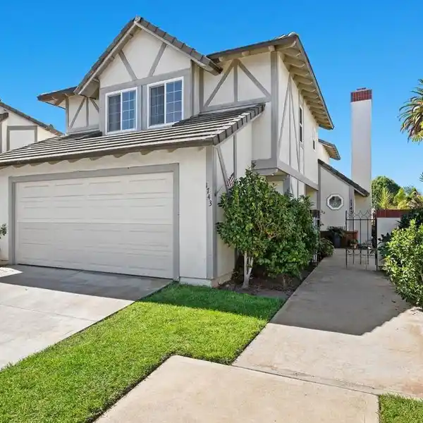 SPACIOUS RESIDENCE FEATURING VAULTED BEAMED CEILINGS