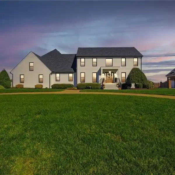 REBUILT COLONIAL WITH PANORAMIC RIVERFRONT LUXURY