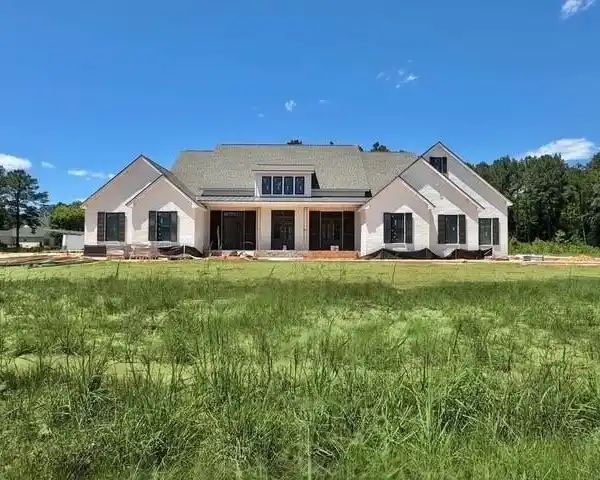 GATED ESTATE LIVING ON NEARLY 2 ACRES